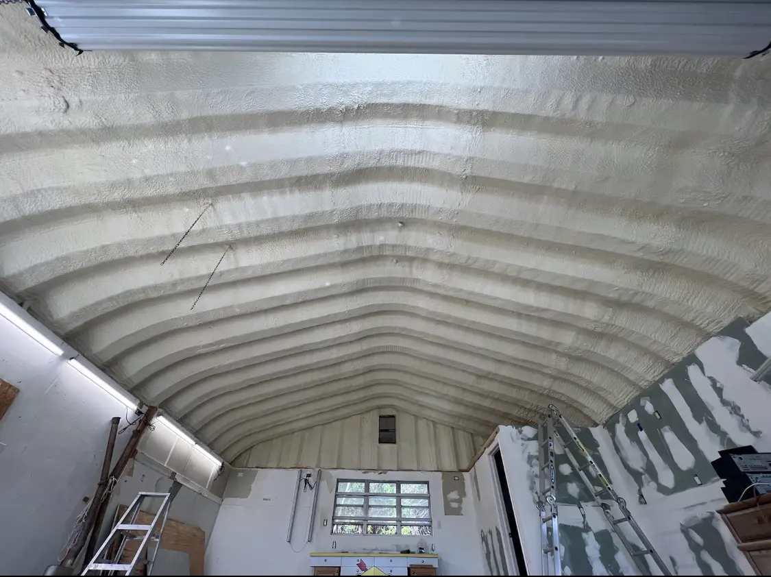 Spray polyurethane foam applied to the underside of a metal roof deck in Ventnor City